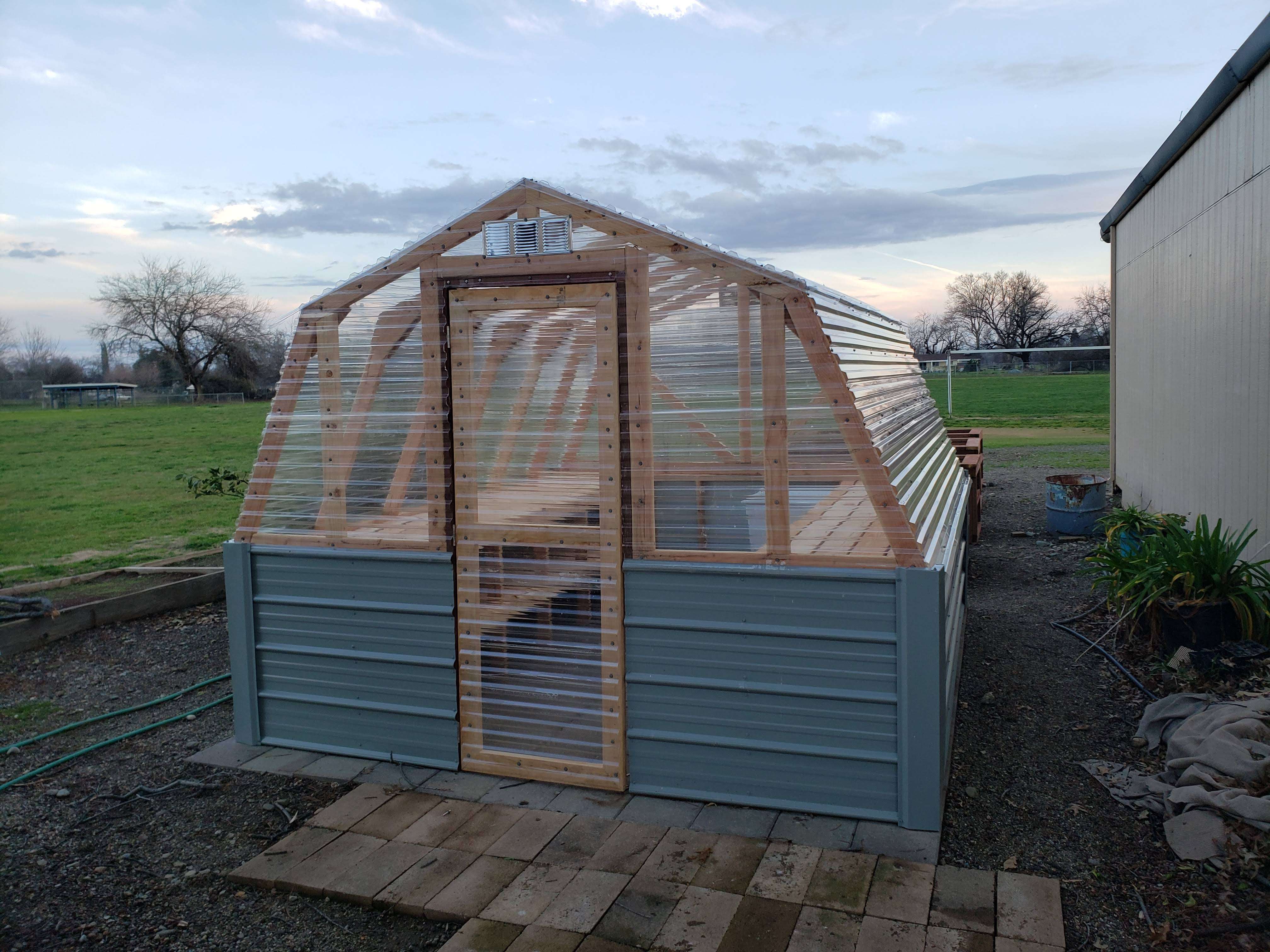 Completed Eagle Scout project — greenhouse and raised garden beds